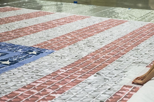 Mindy Kombert and Sherry Kronenfeld, "Flag of Remembrance," detail. Photo by Jin Lee, 9/11 Memorial.