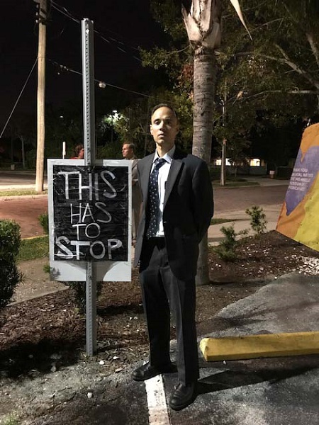 Anthony Gardner at the site of the Pulse nightclub shooting. Photo by Jan Seidler Ramirez.