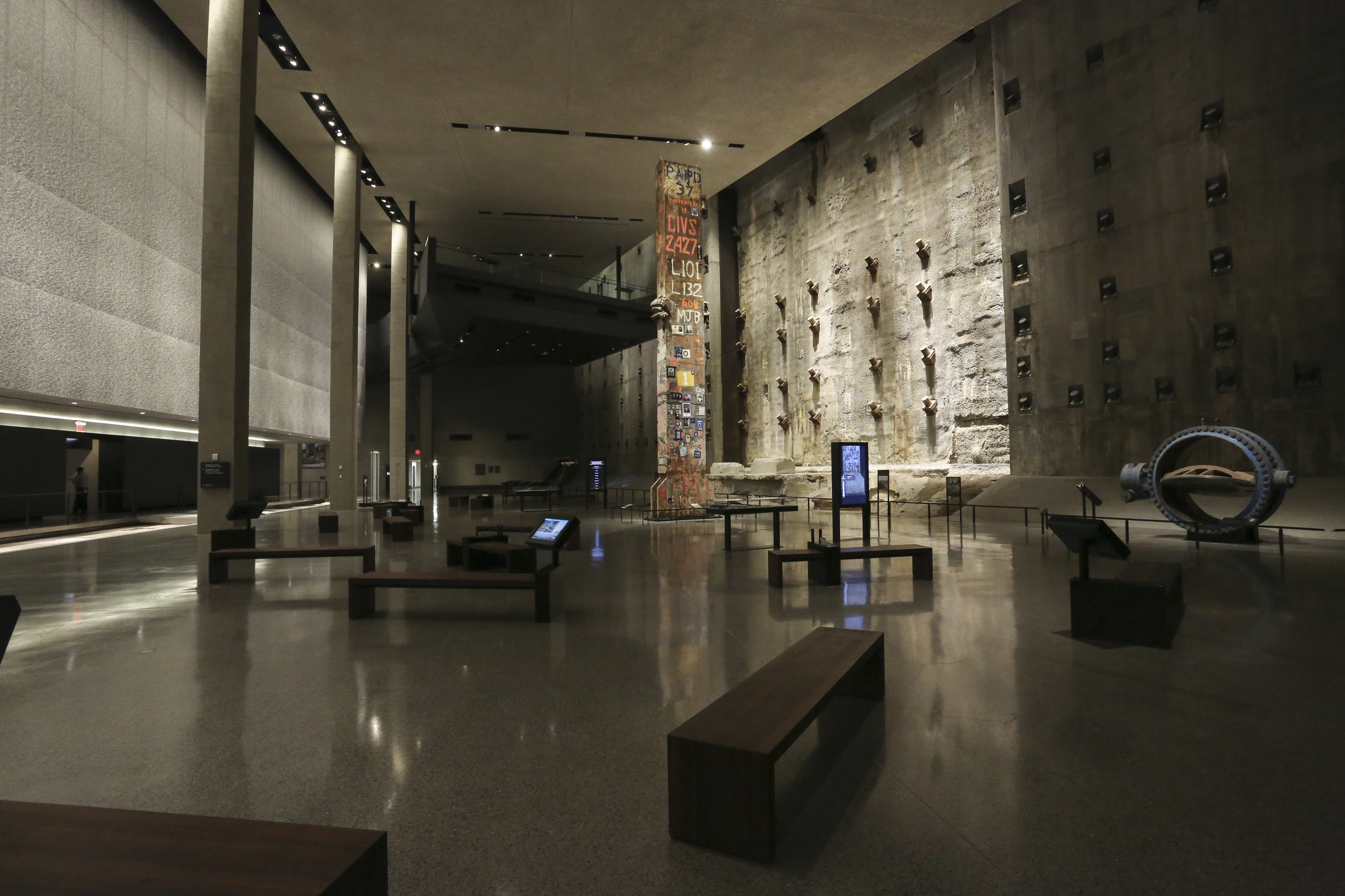 Foundation Hall is seen empty with the slurry wall and Last Column illuminated at its center.