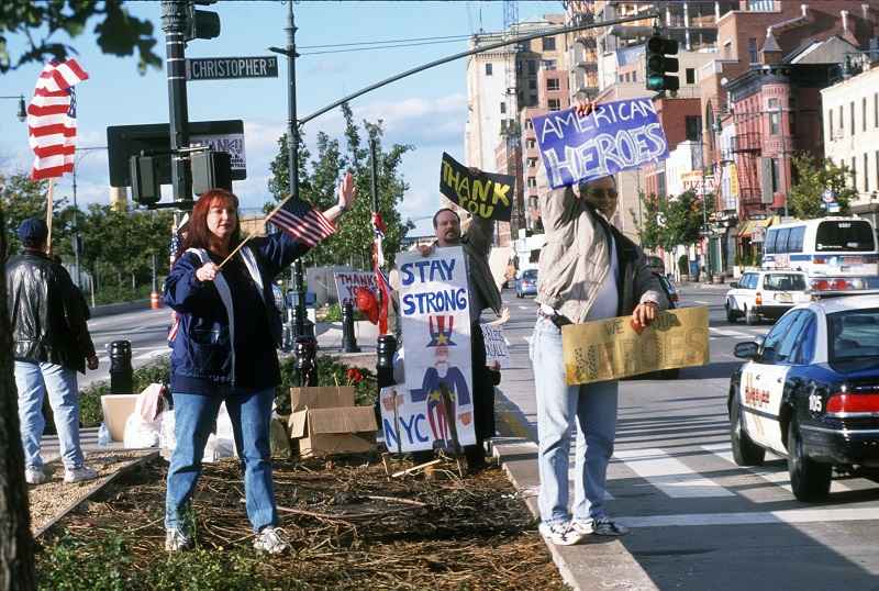 Hero Highway supporters hold signs in lower Manhattan thanking first responders for their efforts.