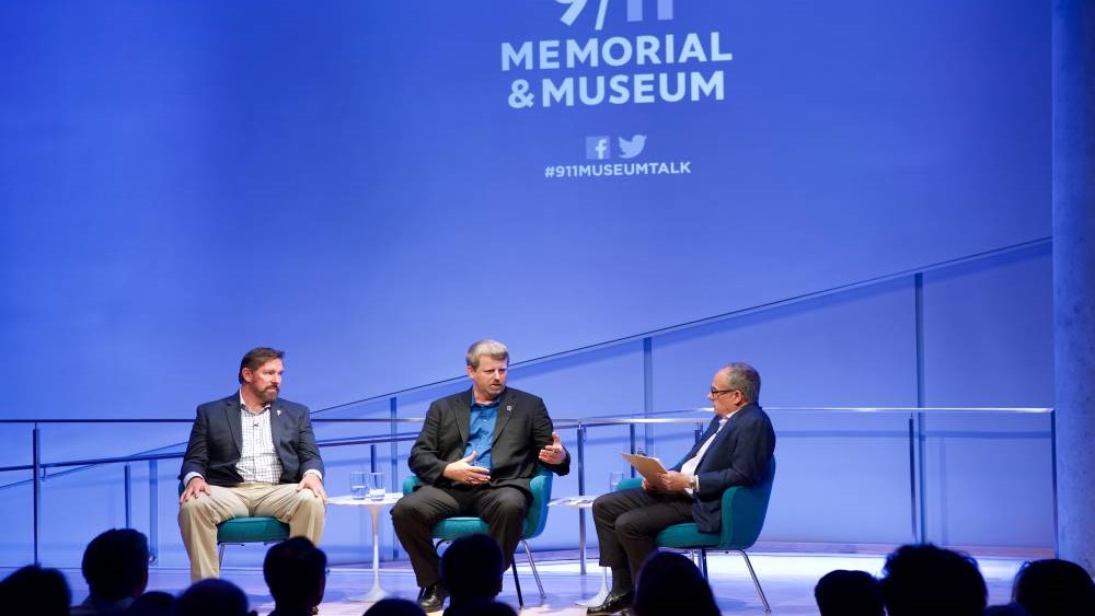 Former special forces commanders Maj. Mark Nutsch and retired Master Sgt. Scott Neil speak onstage as they take part in the public program, The Horse Soldiers.