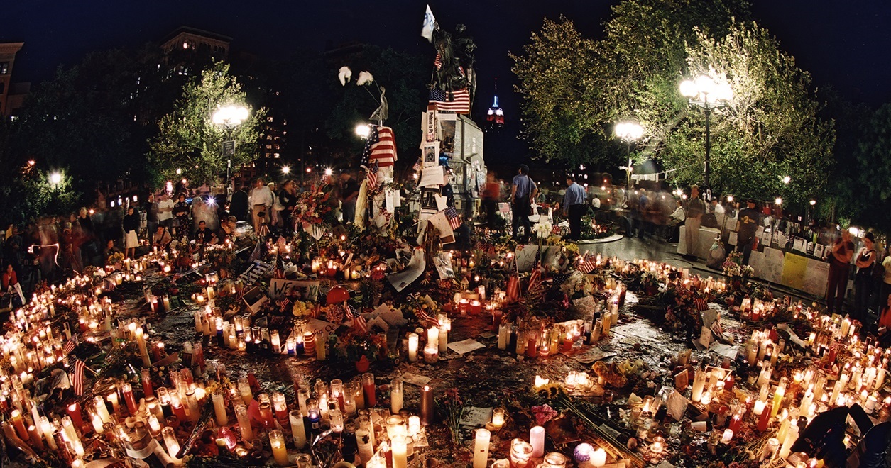 A crowd gathered for a nighttime candlelight vigil in Union Square Park. 