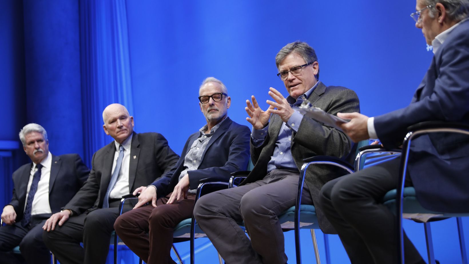 Panelists on stage in February