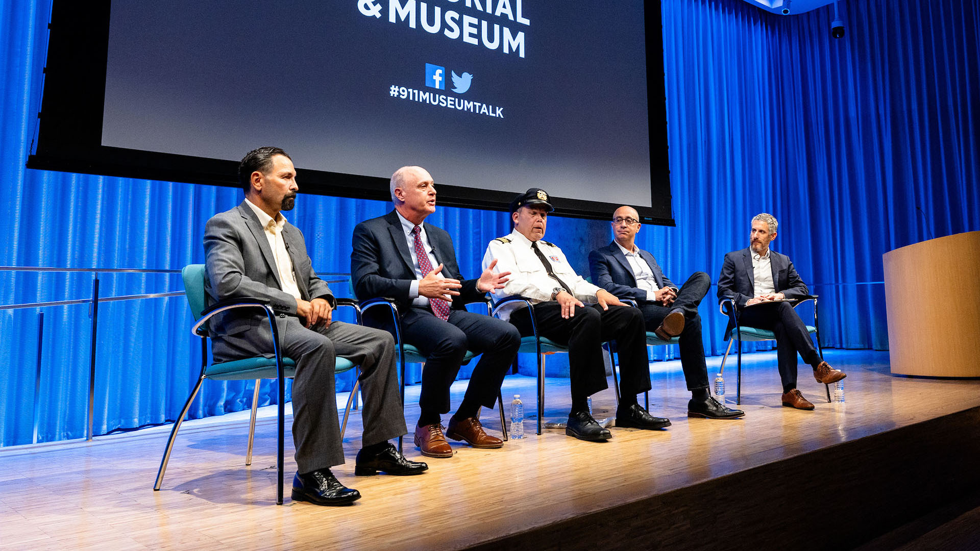 From left: Gulmar Parga, John Hillin (speaking), Richard Thornton, Eddie Rosenstein and Noah Rauch on stage. 