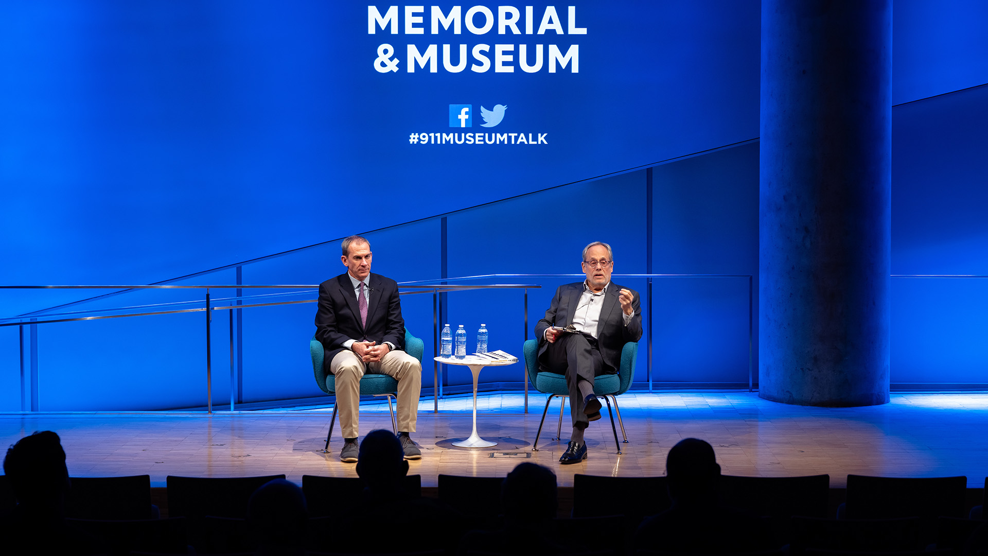 Col. Liam Collins (left) on stage with Clifford Chanin