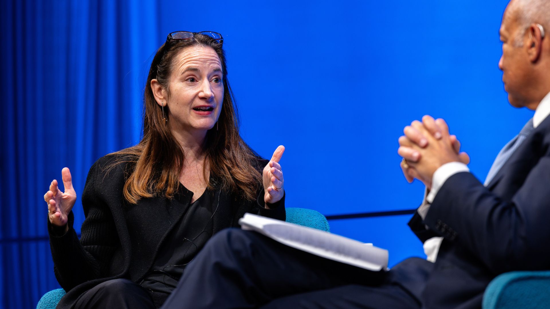 Avril Haines (left) on stage with Jeh Charles Johnson