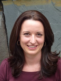 Allison Blais, the chief strategy officer for the 9/11 Memorial & Museum, smiles for a portrait photo.