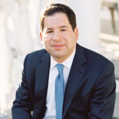 Josh Cherwin, the chief advancement officer and deputy director for institutional advancement at the 9/11 Memorial & Museum, smiles for a portrait photo.