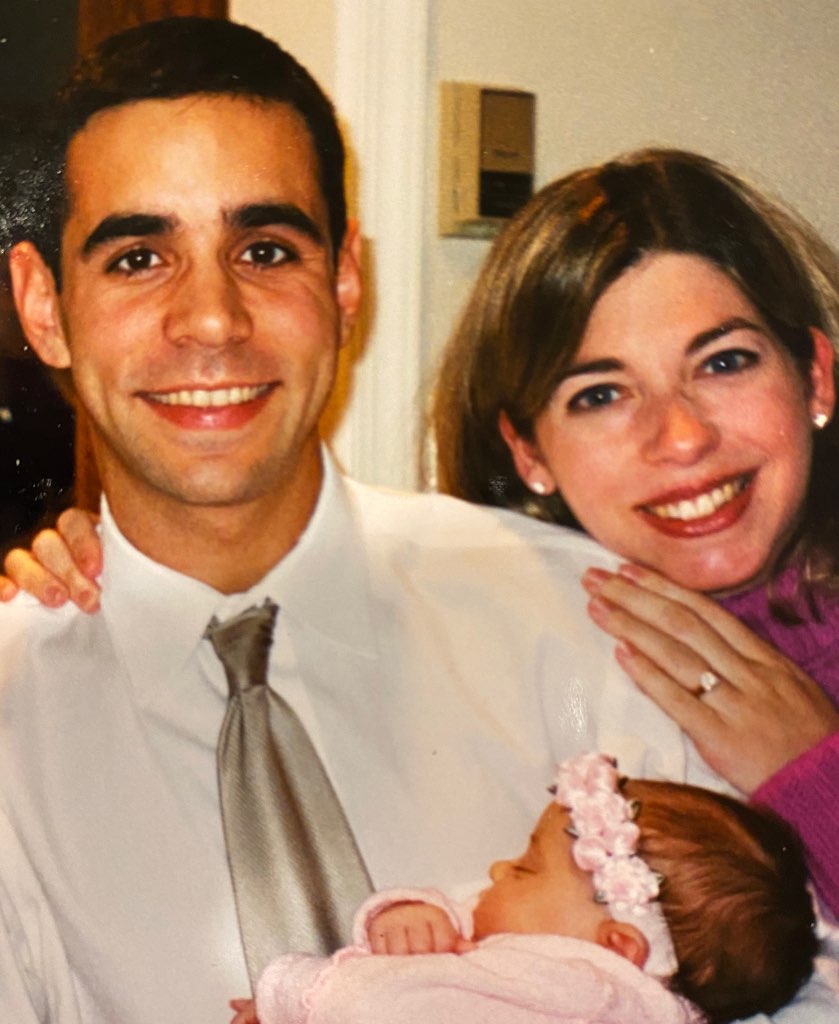 Jon and Erika Leiken pose for a photo with their baby daughter Caleigh.