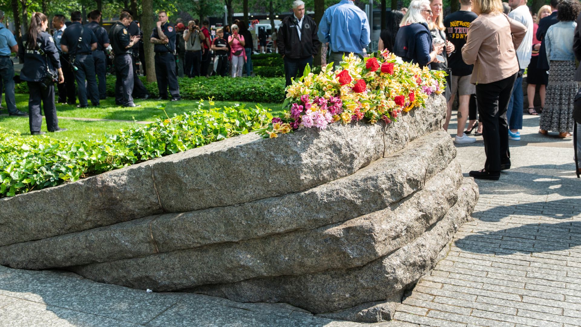 Flowers on one of the Memorial Glade monoliths