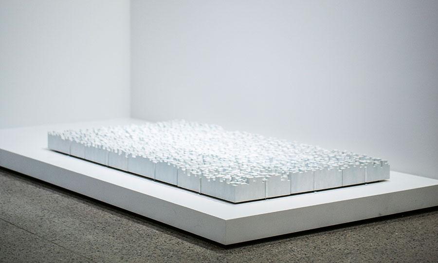 Tobi Kahn’s all-white artwork “M’AHL” is seen on display at the 9/11 Memorial Museum.