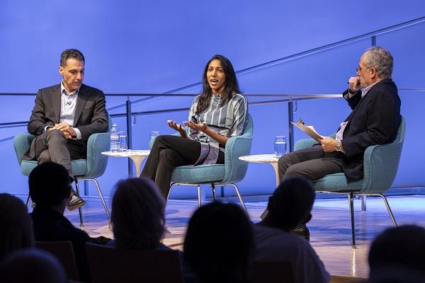 Hany Farid and Vidhya Ramalingam speak onstage during a public program at the Museum auditorium.