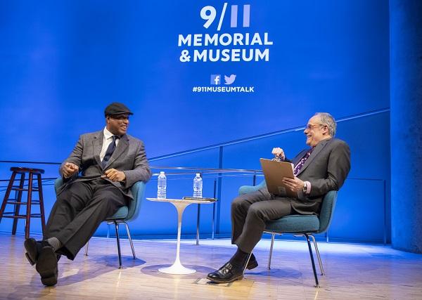 Former Yankees player Bernie Williams speaks with Clifford Chanin, the 9/11 Memorial and Museum executive vice president, during a public program at the Museum auditorium.