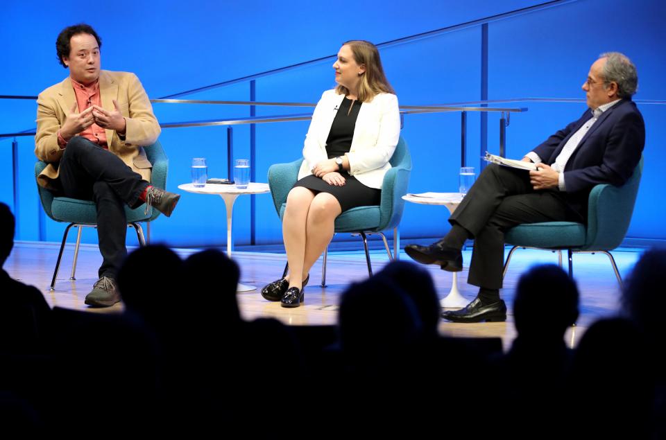 Author Graeme Wood and George Washington University research fellow Devorah Margolin speak onstage at the Museum auditorium.